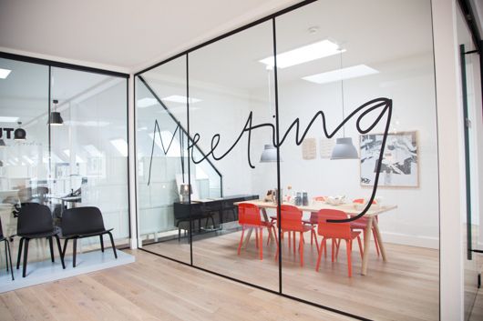 Thin black framed glazed meeting room