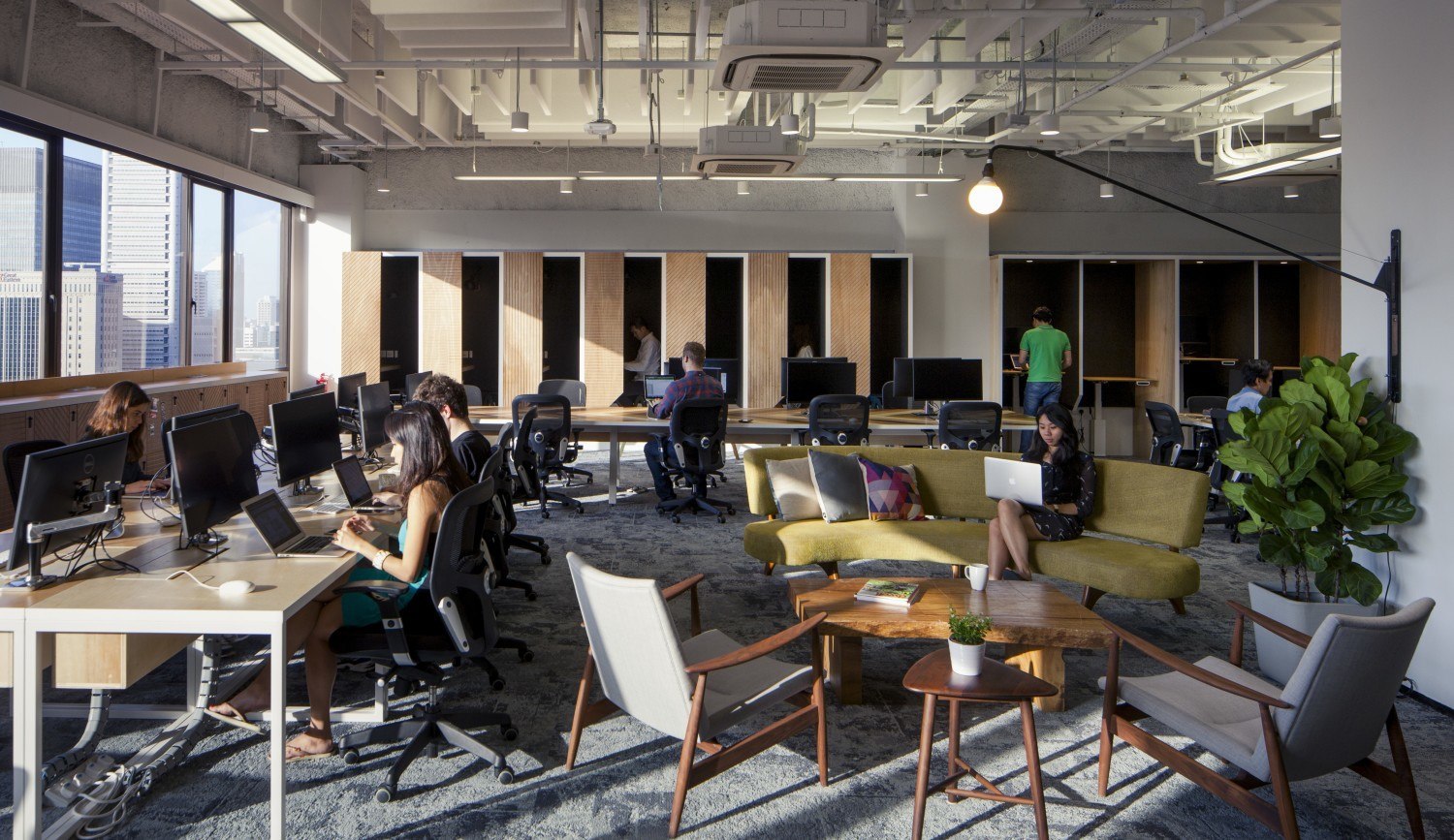 Open plan multifunctional work space from Airbnb's Singapore HQ