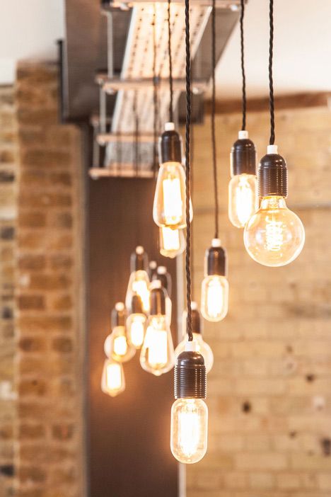 Various Edison style bulbs to create feature lighting in an industrial work space